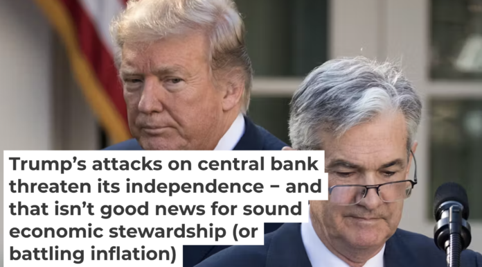 U.S. President Donald Trump looks on as his then-Fed chair nominee Jerome Powell steps to the lectern. Drew Angerer/Getty Images